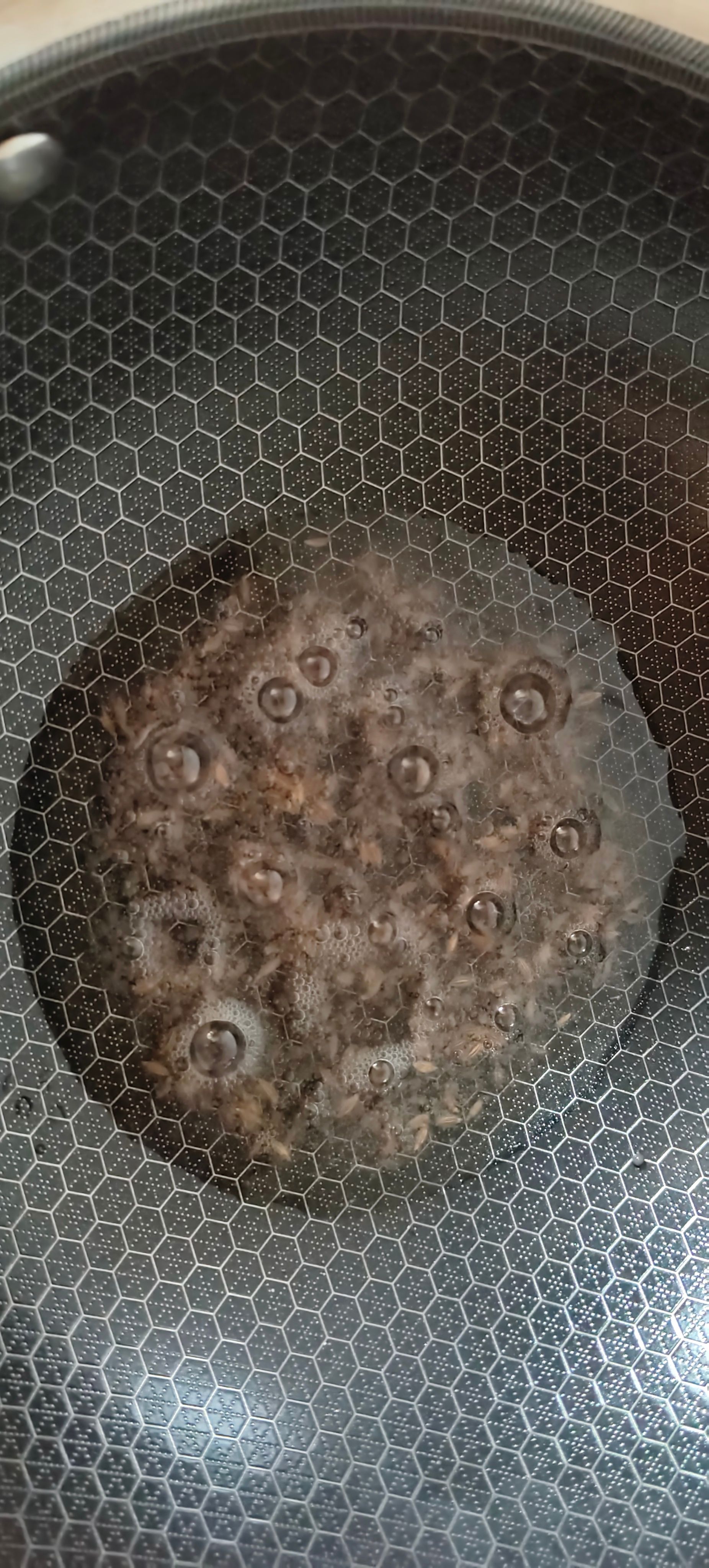 Heat the oil and temper the spices